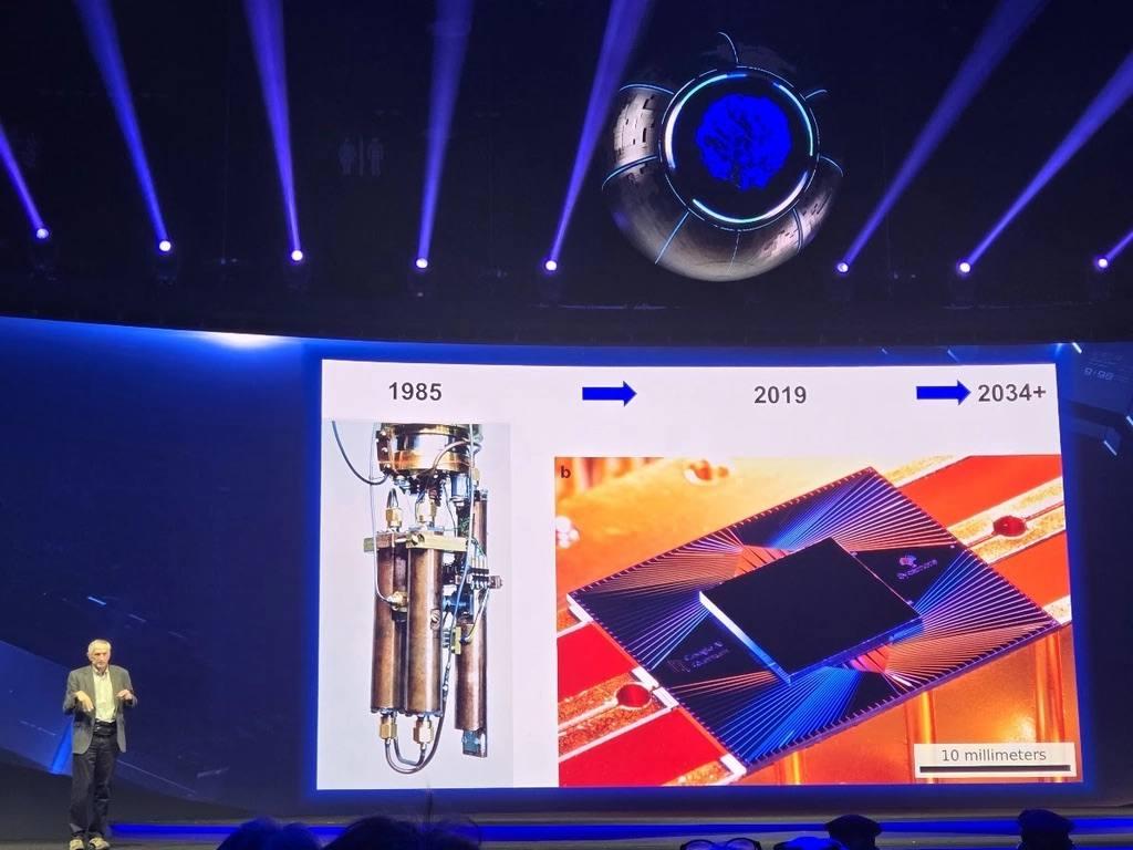 Speaker tracing the shrinking scale of quantum hardware on a main stage