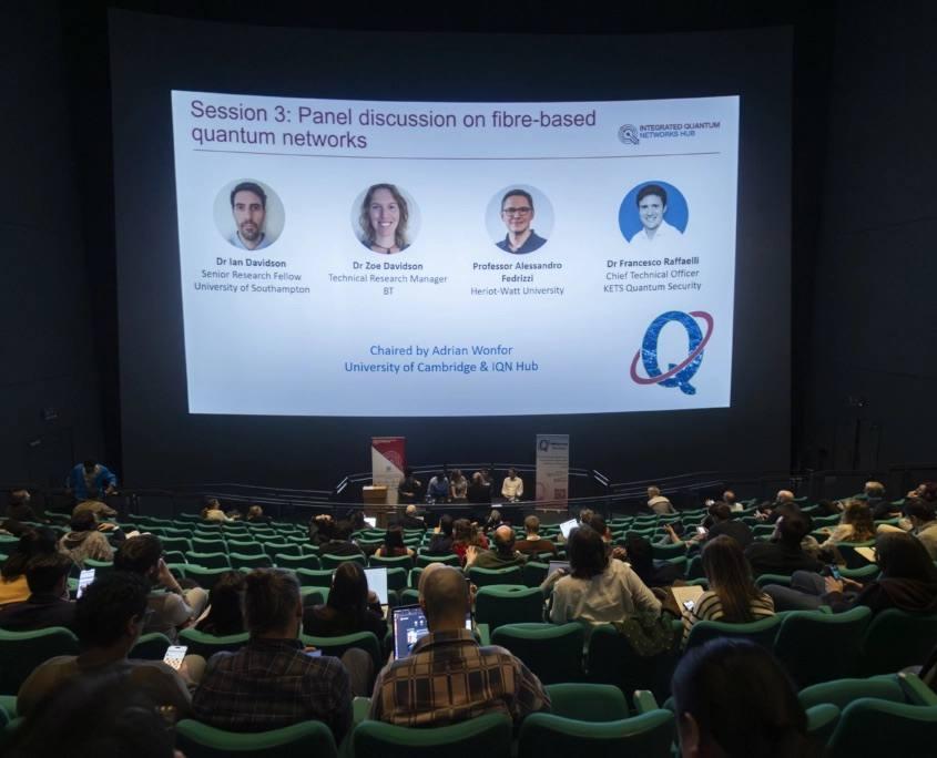 Panel discussion on fibre-based quantum networks in a full auditorium
